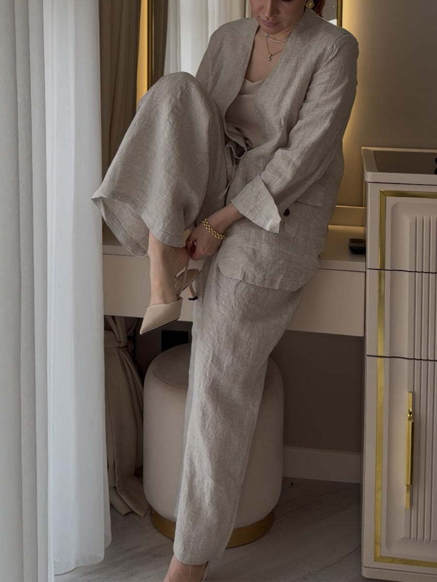 Two-piece Set Featuring A Casual Knit Cotton Top With Cut-out Details And Contrasting Color Trims, Paired With Linen-cotton Blend Trousers.
