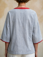Loose-fit Casual Linen Top Featuring Blue-and-white Fine Vertical Stripes, A Round Neck, Three-quarter Sleeves, And Contrasting Red Piping