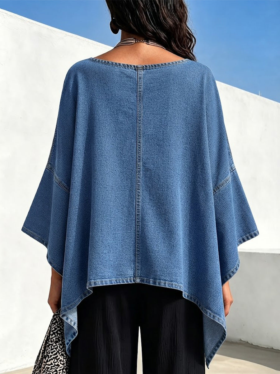 Loose-fit Denim V-neck Cape-style Top Featuring Wide Flared Sleeves, An Asymmetrical Hem, And A Flattering Silhouette